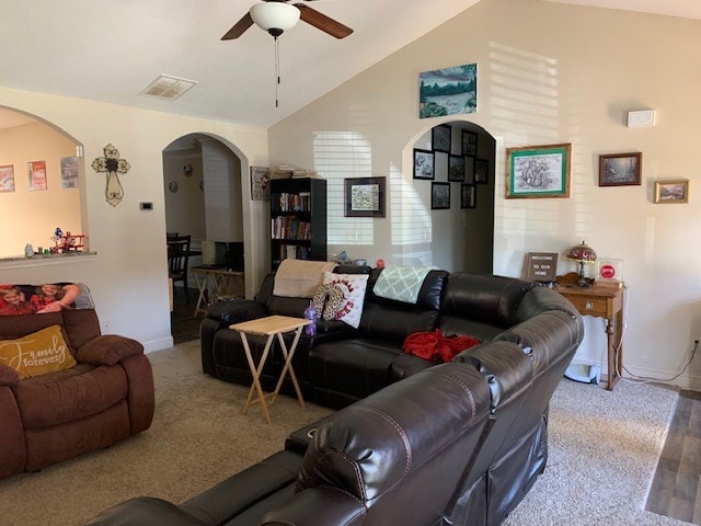 1683 Sara Hunter Ln, Milledgeville, GA 31061 - carpeted living area featuring a ceiling fan, lofted ceiling, and arched walkways