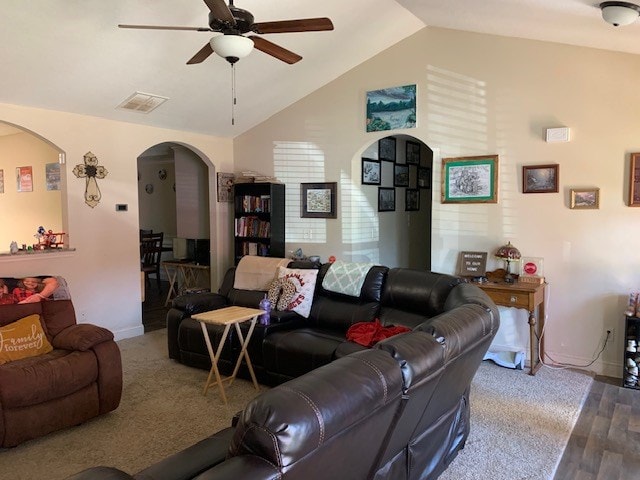 1683 Sara Hunter Ln, Milledgeville, GA 31061 - living area with ceiling fan, arched walkways, and vaulted ceiling