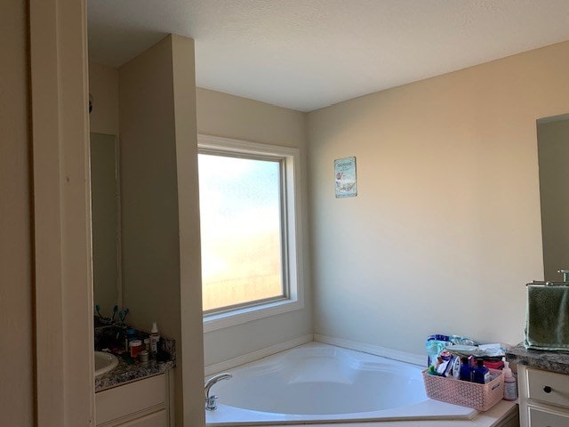 1683 Sara Hunter Ln, Milledgeville, GA 31061 - full bath featuring vanity and a bath