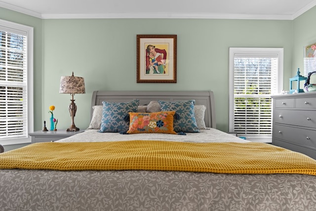 bedroom with ornamental molding