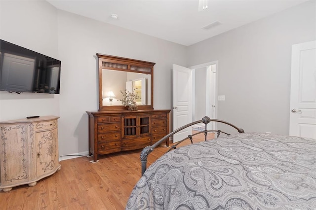 bedroom with light wood-type flooring