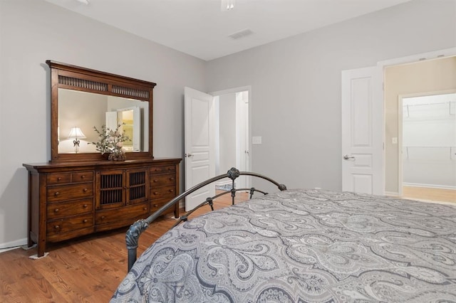 bedroom featuring light hardwood / wood-style flooring