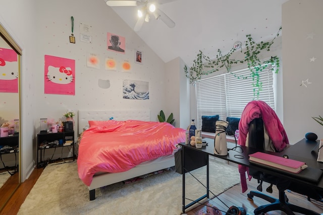 bedroom featuring ceiling fan, high vaulted ceiling, and hardwood / wood-style flooring