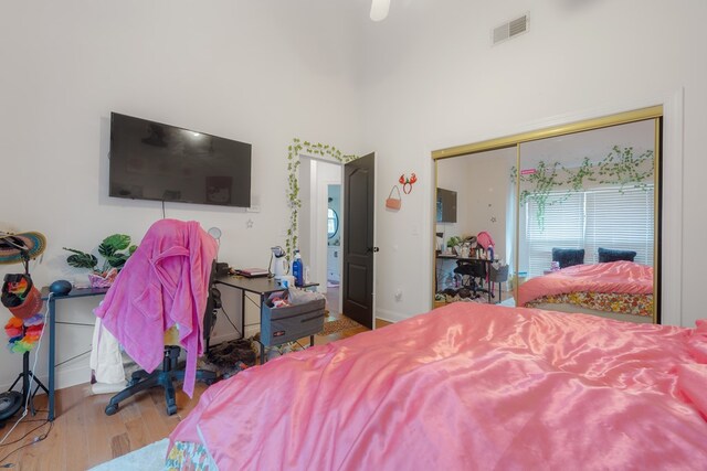 bedroom featuring a closet and hardwood / wood-style flooring