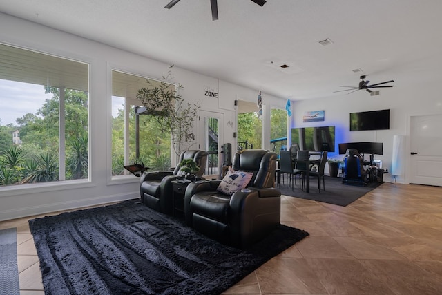 living room with ceiling fan