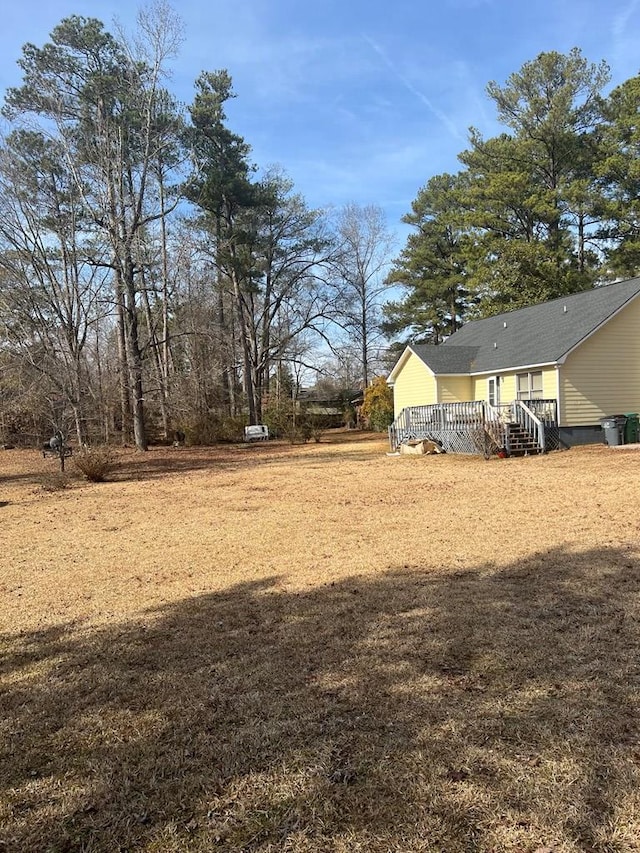 view of yard featuring a deck