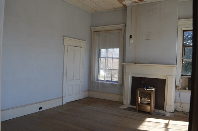 unfurnished living room with hardwood / wood-style floors