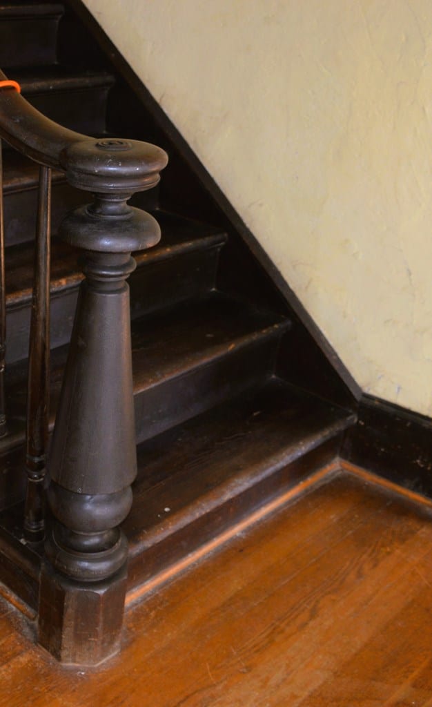 stairway featuring hardwood / wood-style floors