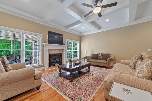 229 Old Plantation Trl, Milledgeville, GA 31061 - living room with beamed ceiling, recessed lighting, a fireplace with raised hearth, a ceiling fan, and coffered ceiling