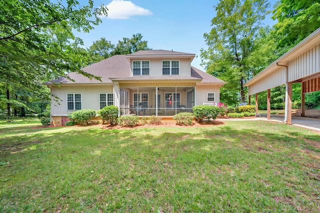 229 Old Plantation Trl, Milledgeville, GA 31061 - rear view of property with a lawn, a shingled roof, and a sunroom