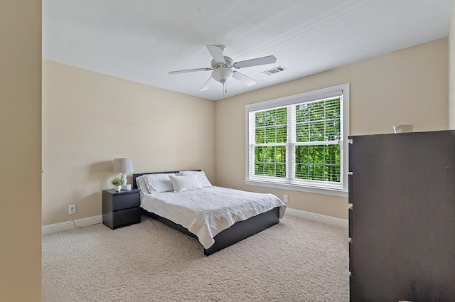 229 Old Plantation Trl, Milledgeville, GA 31061 - carpeted bedroom with baseboards, visible vents, and ceiling fan