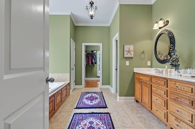 229 Old Plantation Trl, Milledgeville, GA 31061 - full bathroom with a garden tub, ornamental molding, double vanity, and a spacious closet
