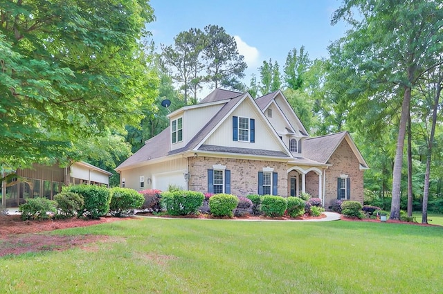 229 Old Plantation Trl, Milledgeville, GA 31061 - craftsman house featuring brick siding, a garage, and a front lawn