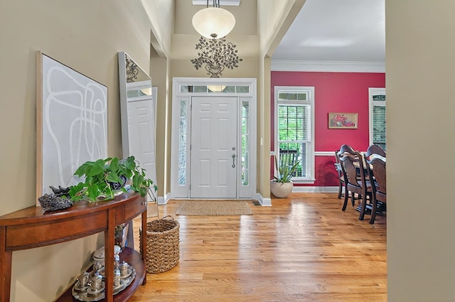 229 Old Plantation Trl, Milledgeville, GA 31061 - entryway with light wood-style floors, baseboards, and ornamental molding