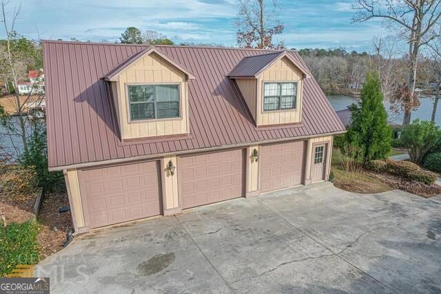 garage featuring driveway