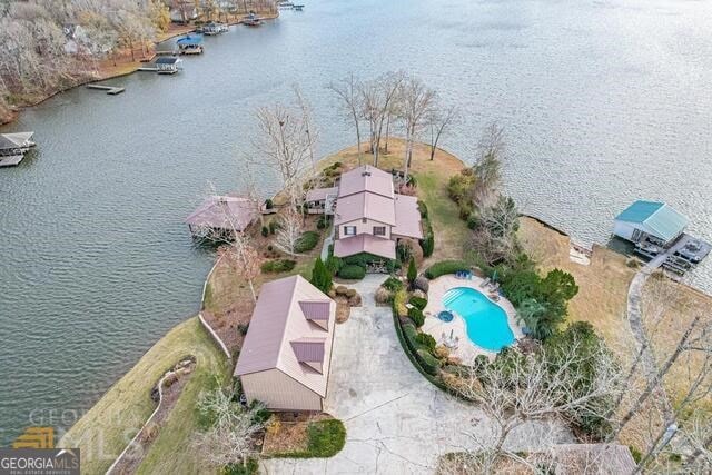 birds eye view of property featuring a water view