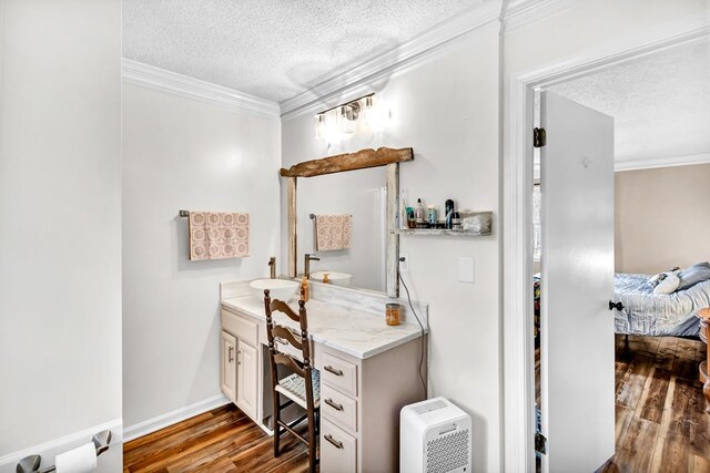 100 Cross Plains Hulett Rd, Carrollton, GA 30016 - ensuite bathroom with wood finished floors, crown molding, and a textured ceiling