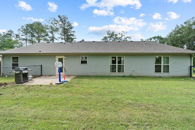167 NW Old Plantation Trl, Milledgeville, GA 31061 - back of property featuring a patio area and a shingled roof