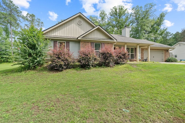 167 NW Old Plantation Trl, Milledgeville, GA 31061 - ranch-style home with a garage, a front lawn, a chimney, brick siding, and concrete driveway