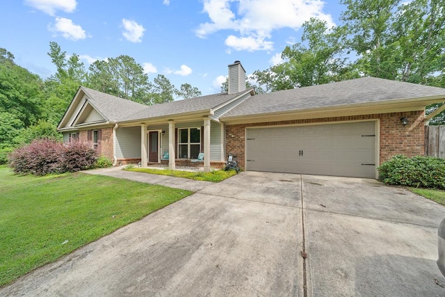 167 NW Old Plantation Trl, Milledgeville, GA 31061 - ranch-style house with brick siding, a garage, a front lawn, and driveway