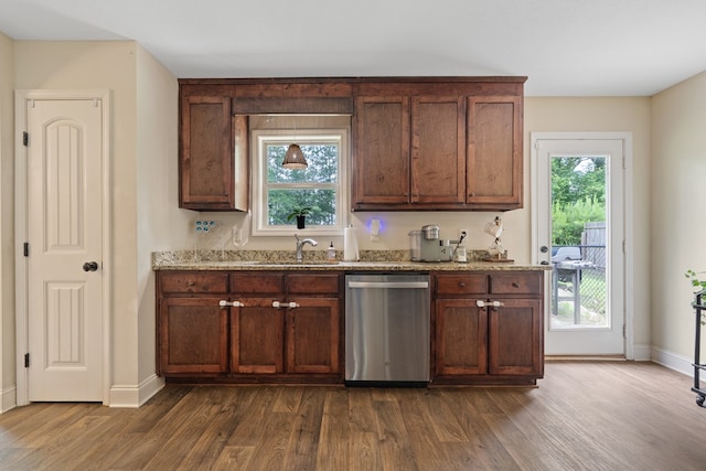 167 NW Old Plantation Trl, Milledgeville, GA 31061 - kitchen featuring dishwasher, dark wood-style flooring, and light stone countertops