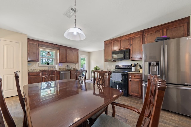 167 NW Old Plantation Trl, Milledgeville, GA 31061 - dining room with dark wood finished floors