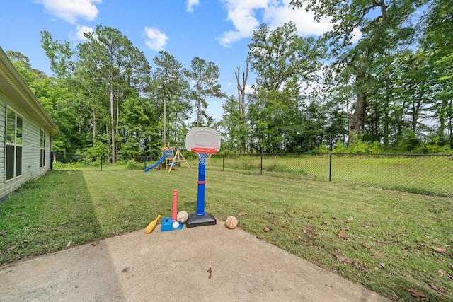 167 NW Old Plantation Trl, Milledgeville, GA 31061 - fenced backyard featuring a playground and a patio area