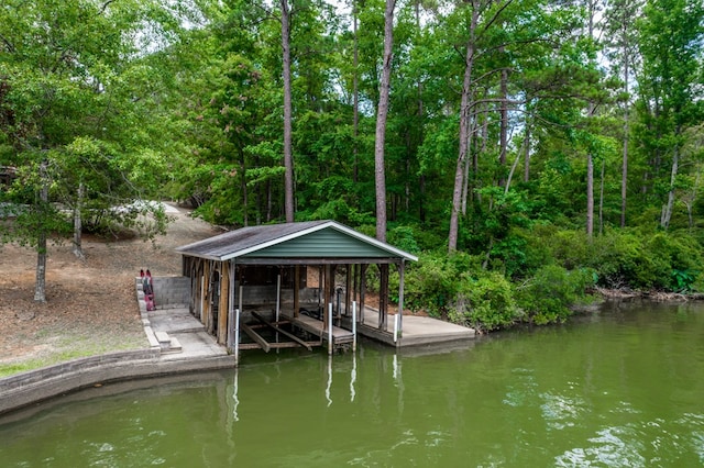 291 Power Point Rd, Milledgeville, GA 31061 - dock featuring boat lift, a water view, and a view of trees