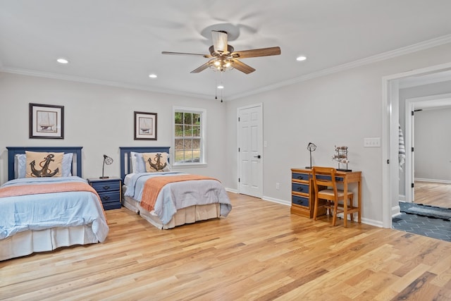 bedroom featuring ceiling fan, light hardwood / wood-style floors, and crown molding