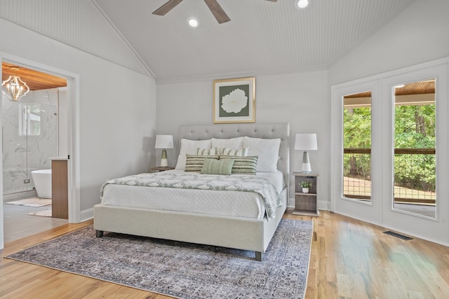 bedroom with vaulted ceiling, ceiling fan, access to outside, and ensuite bath