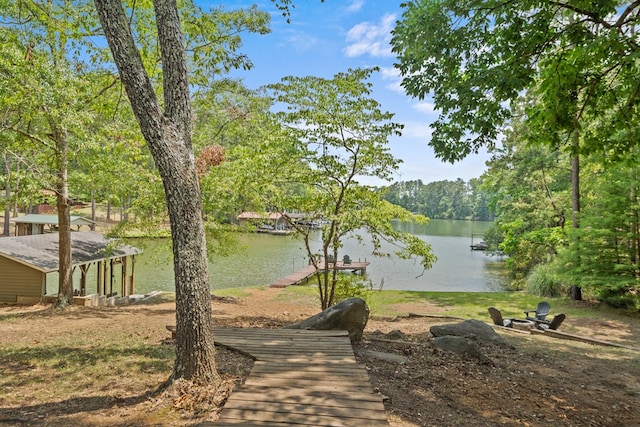 view of water feature with a dock