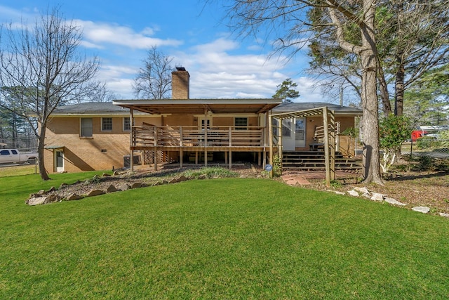 110 Westminster Dr, Eatonton, GA 31024 - back of property featuring a lawn, a chimney, a wooden deck, and stairs