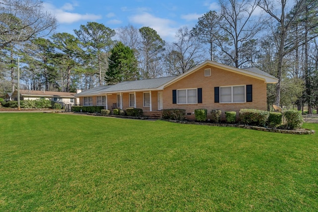 110 Westminster Dr, Eatonton, GA 31024 - ranch-style house featuring brick siding and a front yard