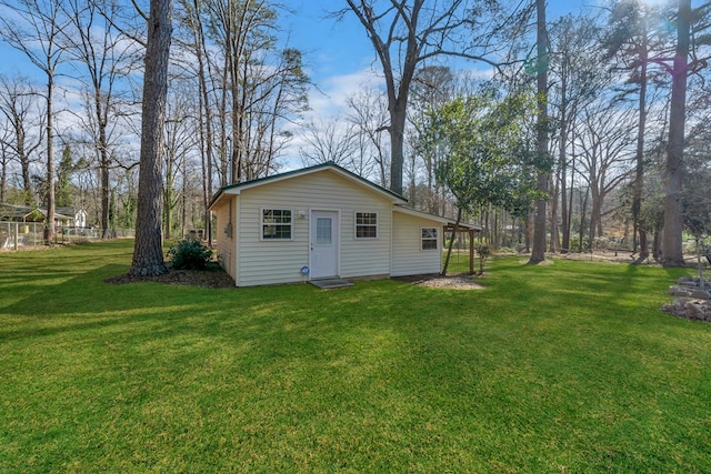 110 Westminster Dr, Eatonton, GA 31024 - rear view of property featuring a lawn