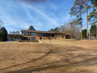 view of front of house with a front lawn