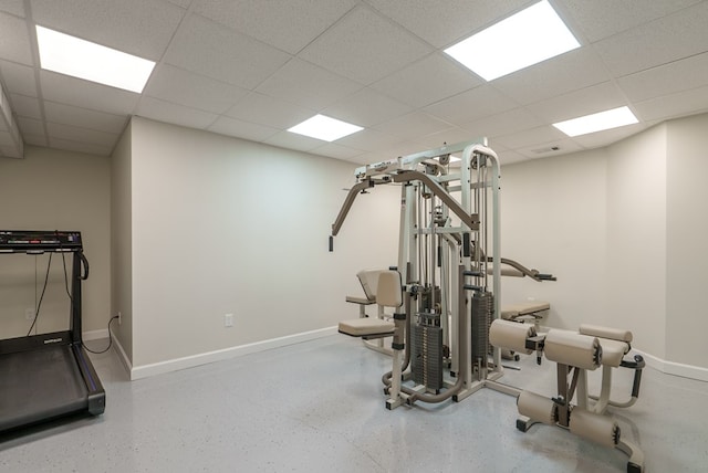 workout room featuring a paneled ceiling