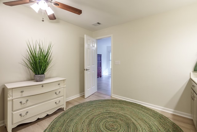 bedroom featuring ceiling fan and light hardwood / wood-style floors