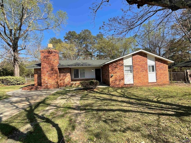 ranch-style house with a front yard