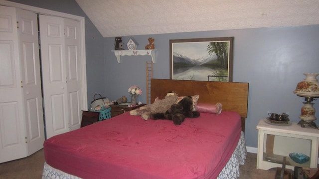 131 NE Carriage Ct, Milledgeville, GA 31061 - bedroom featuring a closet, a textured ceiling, and lofted ceiling