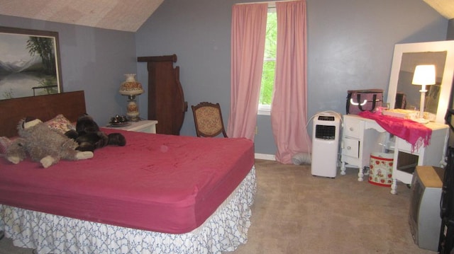 131 NE Carriage Ct, Milledgeville, GA 31061 - bedroom with carpet flooring and vaulted ceiling
