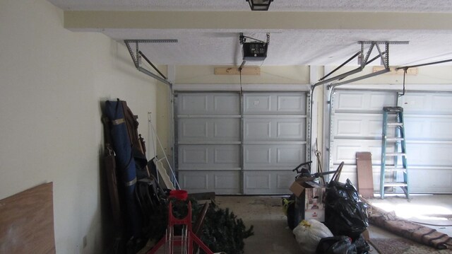 131 NE Carriage Ct, Milledgeville, GA 31061 - garage featuring a garage door opener