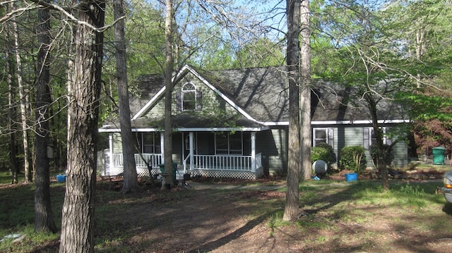 131 NE Carriage Ct, Milledgeville, GA 31061 - view of front of property with roof with shingles and a porch