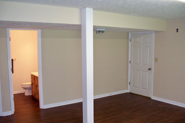 121 Long Island Dr, Eatonton, GA 31024 - finished below grade area featuring dark wood finished floors and baseboards