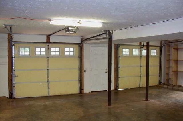 121 Long Island Dr, Eatonton, GA 31024 - garage featuring a garage door opener