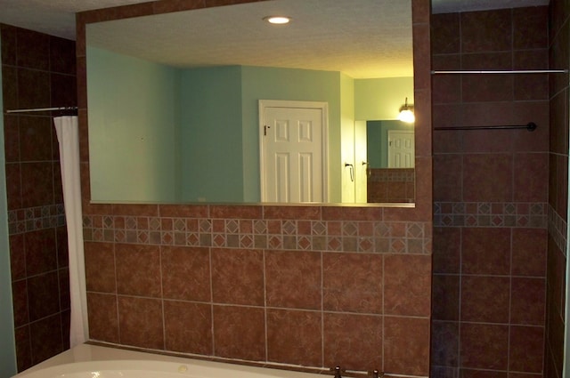 121 Long Island Dr, Eatonton, GA 31024 - bathroom featuring a bath, recessed lighting, and a shower