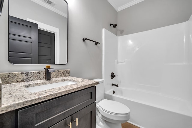 full bathroom with vanity,  shower combination, toilet, and ornamental molding