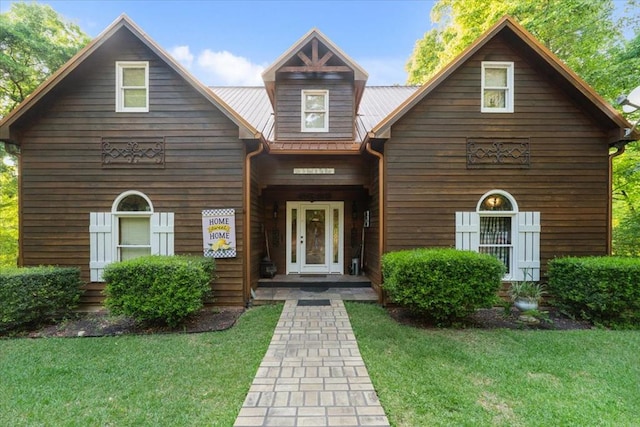 view of front of home with a front yard