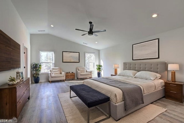 bedroom featuring recessed lighting, vaulted ceiling, a ceiling fan, and light wood-type flooring