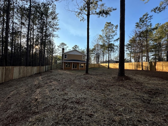 view of yard featuring a fenced backyard