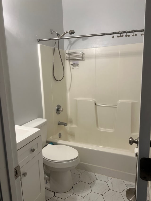 full bathroom featuring vanity, shower / bath combination, and toilet